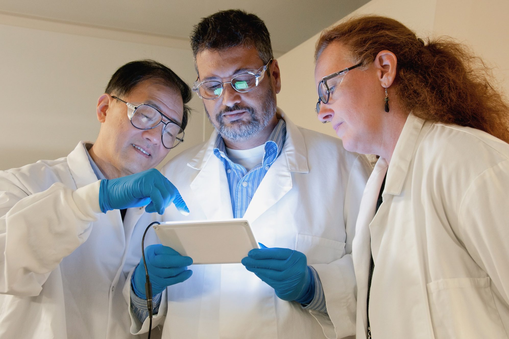 Group of scientists collaborating on an IVD consulting project. 