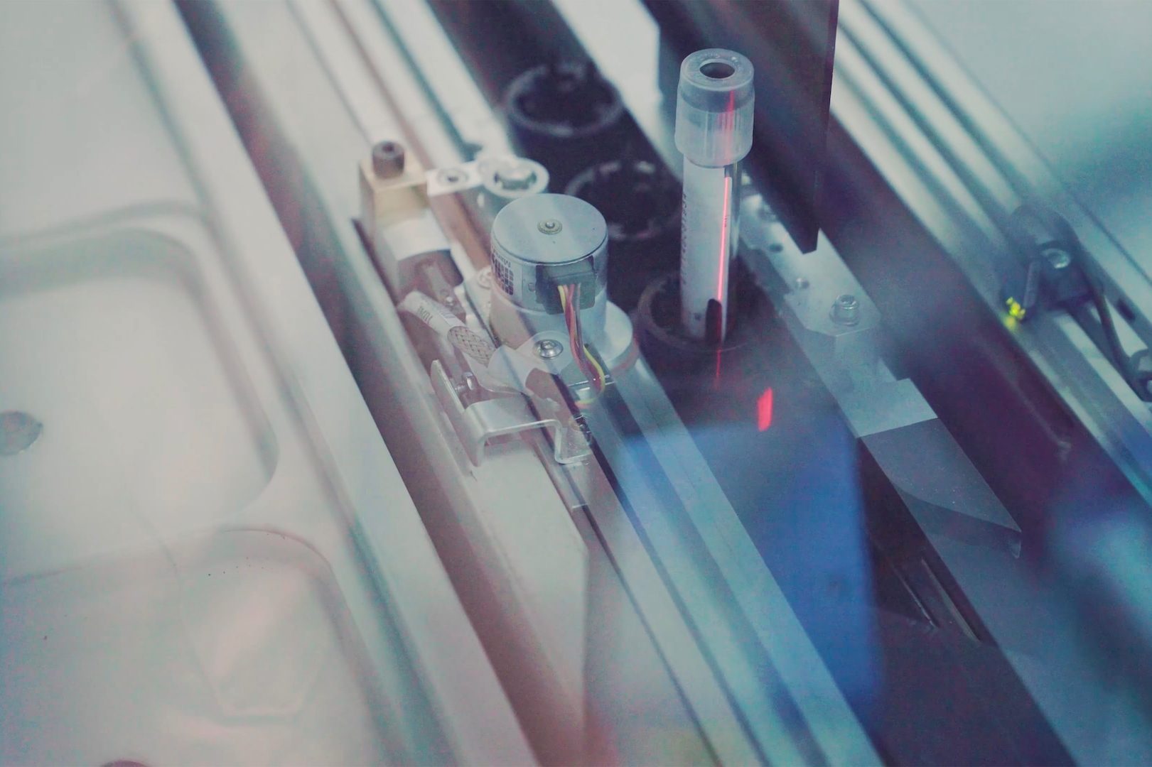 Lateral flow assays being manufactured by a machine.